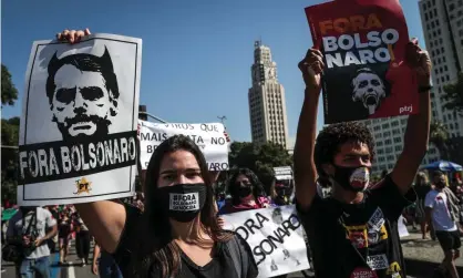  ??  ?? Protesters in Rio de Janeiro demand the removal of the President of Brazil, Jair Bolsonaro. Photograph: Andre Coelho/EPA