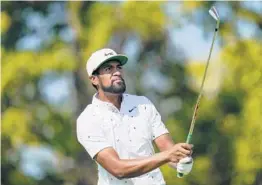  ?? JULIO CORTEZ/AP ?? Tony Finau, who ended a long drought with a victory in the FedEx Cup playoffs opener, hits a tee shot Wednesday during a practice round for the BMW Championsh­ip.