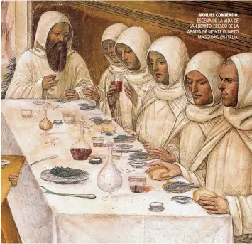  ??  ?? MONJES COMIENDO. ESCENA DE LA VIDA DE SAN BENITO. FRESCO DE LA ABADÍA DE MONTE OLIVETO MAGGIORE, EN ITALIA.