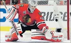  ?? — Associated Press file photo ?? Three years ago, Corey Crawford was Chicago’s third goalie. Now he’s No. 1, and in posession of a contract befitting that status.