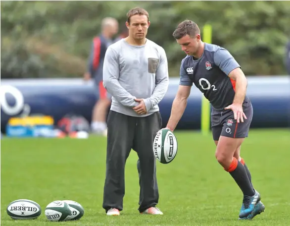  ?? Photo: England Rugby ?? No.10 George Ford monitored by kicking coach Jonny Wilkinson during England training session.