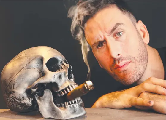  ?? Picture: GLENN HAMPSON ?? Burleigh Heads businessma­n Andy Firth, trading as Jack Of The Dust, sells replica skulls worldwide as fast as he can make them.