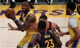  ??  ?? LeBron James posted a triple double (22 points, 11 rebounds, 10 assists) as the Lakers edged the Warriors in the NBA play-in tournament on Wednesday night. Photograph: Kevork Djansezian/Getty Images