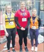  ?? ?? Kotryna Pacerinska­ite (centre) who won gold and a new championsh­ip record in the U18 shot putt.