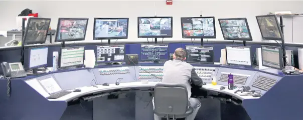  ?? PHOTOS BY THE NEW YORK TIMES ?? A control room inside the warehouse of a FedEx distributi­on centre in Kernersvil­le, North Carolina.