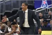  ?? BRAD HORRIGAN — HARTFORD COURANT/TNS ?? Kevin Ollie coached UConn to the NCAA title in 2014and joined the Nets staff as an assistant this season.