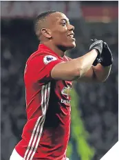  ??  ?? Anthony Martial takes the plaudits.