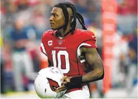  ?? ROSS D. FRANKLIN AP ?? Arizona receiver DeAndre Hopkins will miss the first six games of season for PEDs.