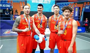  ?? Photo: webthethao.vn ?? HOPING FOR BETTER: The 3x3 men's basketball team won bronze at SEA Games 30 in the Philippine­s. This year, they are hoping to finish higher.