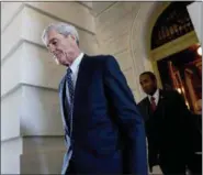  ?? ANDREW HARNIK — THE ASSOCIATED PRESS ?? In this file photo, former FBI Director Robert Mueller, the special counsel probing Russian interferen­ce in the 2016 election, departs Capitol Hill following a closed door meeting in Washington.