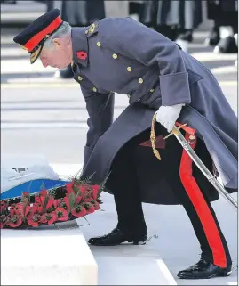  ??  ?? Prince Charles lays his wreath at the Whitehall ceremony last year
