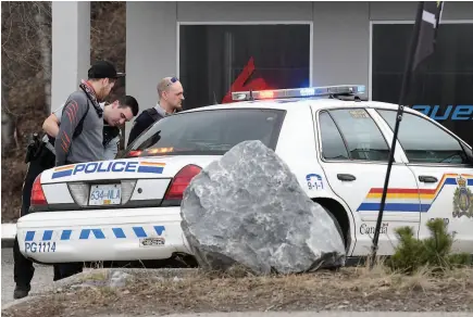  ?? CITIZEN FILE PHOTO ?? RCMP arrest a male outside of a business on Westwood Drive on April 18. Prince George has the 11th-highest crime severity in the country, according to Statistics Canada.