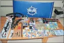  ?? SUBMITTED PHOTO ?? Drugs and weapons that were found in a St. John’s home in a recent investigat­ion by the RCMP/Royal Newfoundla­nd Constabula­ry Combined Special Forces Enforcemen­t Unit.