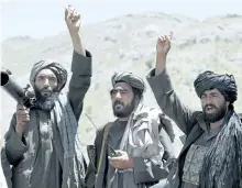  ?? ASSOCIATED PRESS FILES ?? Taliban fighters react to a speech by a senior leader of a breakaway faction of the Taliban in May. Taliban officials say the extremist group has appointed Maulvi Ibrahim Sadar as the new military chief.