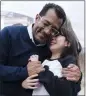  ?? JOSE LUIS MAGANA THE ASSOCIATED PRESS ?? Former Nicaragua presidenti­al candidate Felix Maradiaga hugs his daughter, Alejandra, after being freed in Nicaragua and arriving at Washington Dulles Internatio­nal Airport, in Chantilly, Va., on Thursday.