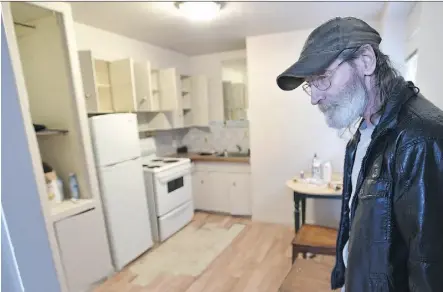  ?? ED KAISER/EDMONTON JOURNAL ?? Caretaker Kevin Schmitt in the rooming house suite where Donna Donovan died alone on the floor last month while on the waiting list for help with Homeward Trust.