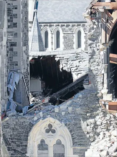  ?? Photo: KIRK HARGREAVES/FAIRFAX NZ ?? She’ll have to go: Damage at Christ Church Cathedral, viewed from a crane basket onsite.