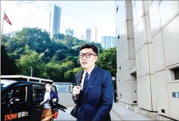  ?? ANTHONY WALLACE/AFP ?? Pro-independen­ce protester Edward Leung arrives at the High Court before facing rioting charges in Hong Kong on January 18, for his part in the ‘Fishball Revolution’ that took place in 2016.