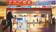  ?? Rex Features ?? A Tesco Extra outlet in London. Tesco has finalised a threeyear purchasing alliance with Carrefour to increase their leverage with supermarke­t suppliers.