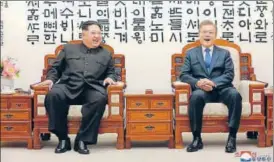  ?? AFP ?? This picture released by North Korea's Korean Central News Agency shows Kim Jong Un (left) with South Korea's President Moon Jaein at the Peace House building at the truce village of Panmunjom.