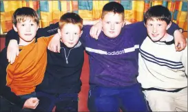  ?? ?? Ethan McCormack, Adam Douglas, Stefan Walsh and Scott McCormack at the Adair Primary School quiz night held in Fermoy Rowing Club in 2001.