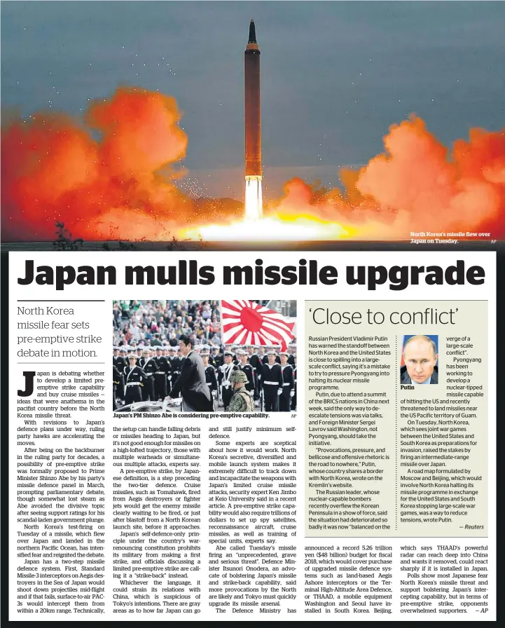  ?? AP AP ?? Japan’s PM Shinzo Abe is considerin­g pre-emptive capability. North Korea’s missile flew over Japan on Tuesday. Putin