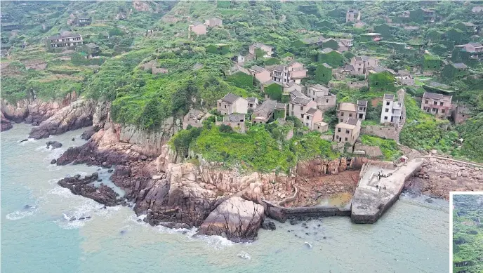  ??  ?? This May 19, 2018 drone photo shows ruins of a building in the abandoned fishing village of Houtouwan on the remote island of Shengshan, 90 kilometres off the coast of Shanghai.