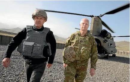  ?? PHOTOS: SUPPLIED ?? Australian Prime Minister Malcolm Turnbull and Chief of the Defence Force Air Marshall Mark Binskin arrive at Camp Qargha in Afghanista­n.