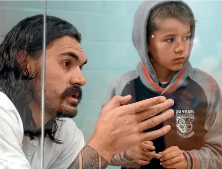  ?? PHOTOS: OKC THUNDER/FACEBOOK ?? New Zealand’s NBA star Steven Adams assures a shy youngster he’s got nothing to worry about at his camp in Auckland.