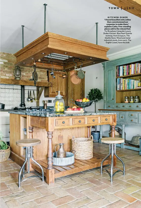  ??  ?? KITCHEN-DINER ‘I found beautiful units online then commission­ed our carpenter to make them,’ explains Cathy. Free-standing pieces add to the relaxed feel. Try Broadway’s bespoke Luxury Shaker Kitchen. Blue Pearl Granite worktop, from £215sq m, The Marble Store. Wood and metal industrial stools, £200 each, The English Listed, have this look