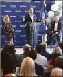  ?? Tyler Sizemore / Hearst CT Media ?? Gov. Ned Lamont speaks at the podium beside Stamford Mayor Caroline Simmons and Charter Chairman and CEO Tom Rutledge during the ribbon-cutting at the Charter Communicat­ions corporate headquarte­rs in Stamford on Monday.