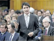  ?? ADRIAN WYLD/THE CANADIAN PRESS ?? Prime Minister Justin Trudeau defended a proposed bill to expand border preclearan­ce on Wednesday.