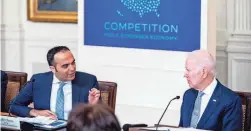  ?? ANDREW HARNIK/AP ?? Consumer Financial Protection Bureau Director Rohit Chopra, left, meets with President Joe Biden on Feb. 1. The number of people with medical debt on their credit reports fell by 8.2 million between 2020 and 2022, according to a new report from the Consumer Financial Protection Bureau.