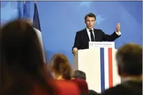  ?? GEERT VANDEN WIJNGAERT — THE ASSOCIATED PRESS ?? France’s President Emmanuel Macron speaks during a media confernce at an EU summit in Brussels, Friday, March 24, 2023. European leaders gathered Friday to discuss economic and financial challenges and banking rules, seeking to tamp down concerns about eventual risks for European consumers from banking troubles in the US and Switzerlan­d.