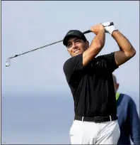  ?? AP/PETER MORRISON ?? Francesco Molinari said he is “well aware of the challenges ahead” as he tries to defend his title at the British Open, which begins Thursday in Northern Ireland.