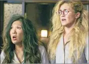  ?? Mark Taylor TBS ?? A RESCUE isn’t what it seems in a new “Wrecked” on TBS. With Ally Maki, left, and Jessica Lowe.