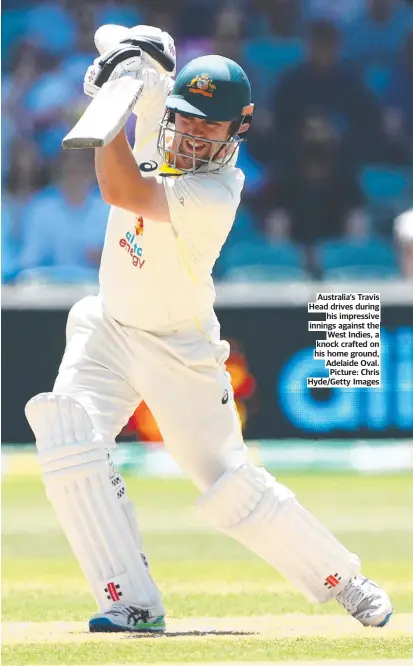  ?? ?? Australia’s Travis Head drives during his impressive innings against the West Indies, a knock crafted on his home ground, Adelaide Oval. Picture: Chris Hyde/Getty Images