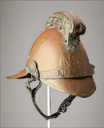  ??  ?? NEW SOUTH WALES, Australia, fireman’s brigade helmet.