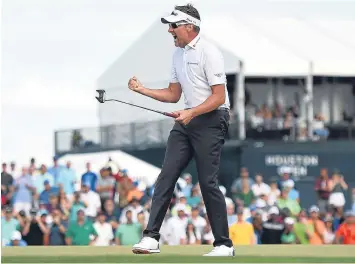  ??  ?? Ian Poulter shows his delight as he sinks the winning putt to triumph in the Houston Open.