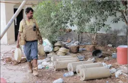  ?? PICTURE: EPA-EFE ?? A member of Yemeni government forces holds mines during fighting against Houthi rebels in the port city of Hodeidah. A reader says the crisis in Yemen needs to end.