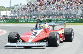  ?? THE CANADIAN PRESS ?? F1 racing is all about fathers and sons. Prior to Sunday’s Canadian Grand Prix, Jacques Villeneuve did a tribute lap in the Ferrari his father Gilles piloted to victory in the inaugural race four decades ago.