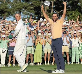  ?? ?? Two-time champ: Scottie Scheffler celebrates on the 18th green after winning The Masters./