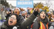  ?? Chip Somodevill­a / Getty Images ?? Activists rally Tuesday outside the U.S. Supreme Court in Washington in support of the DACA program.