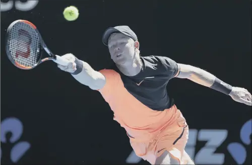  ?? PICTURE: DITA ALANGKARA/AP ?? STRETCHING FOR SUPREMACY: Kyle Edmund reaches for a forehand return to Grigor Dimitrov during their quarter-final at the Australian Open.