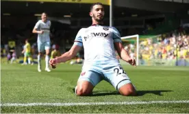  ?? Rob Newell/CameraSpor­t/Getty Images ?? Saïd Benrahma celebrates his second goal for West Ham against Norwich. Photograph: