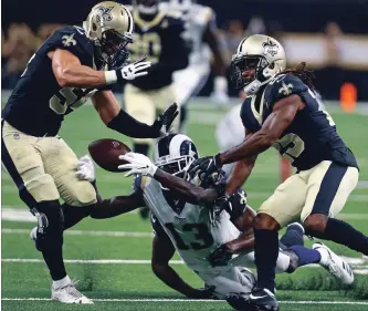  ?? ASSOCIATED PRESS FILE PHOTO ?? The NFC is a two-team race between the Saints and Rams, who met in a high-scoring affair won by host New Orleans in early November. Both are 11-2, making their final three weeks critical in that race.