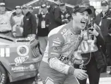  ?? MATT KELLEY/AP ?? 2018 NASCAR Cup Series champion Joey Logano celebrates after ending a 40-race winless drought with a victory Sunday at Darlington Raceway.