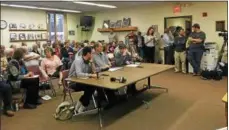  ?? PHOTO BY MAUREEN WERTHER — FOR DIGITAL FIRST MEDIA ?? Another standing-room-only crowd showed up for a Tuesday meeting in Milton to discuss the purchase of a vacant Boy Scout camp.