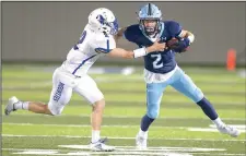  ?? NWA Democrat-Gazette/ANDY SHUPE ?? Springdale Har-Ber’s Hunter Wood (right) attempts to shake off Rogers High’s Nate Hahn on Friday at Wildcat Stadium in Springdale. Visit nwadg.com/photos for more photos from the game.