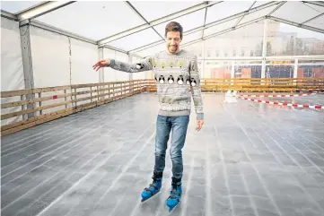  ?? ?? ATTRACTION: Dundee City Council leader John Alexander tries out the ice rink at Slessor Gardens ahead of its opening. Picture by Kim Cessford.